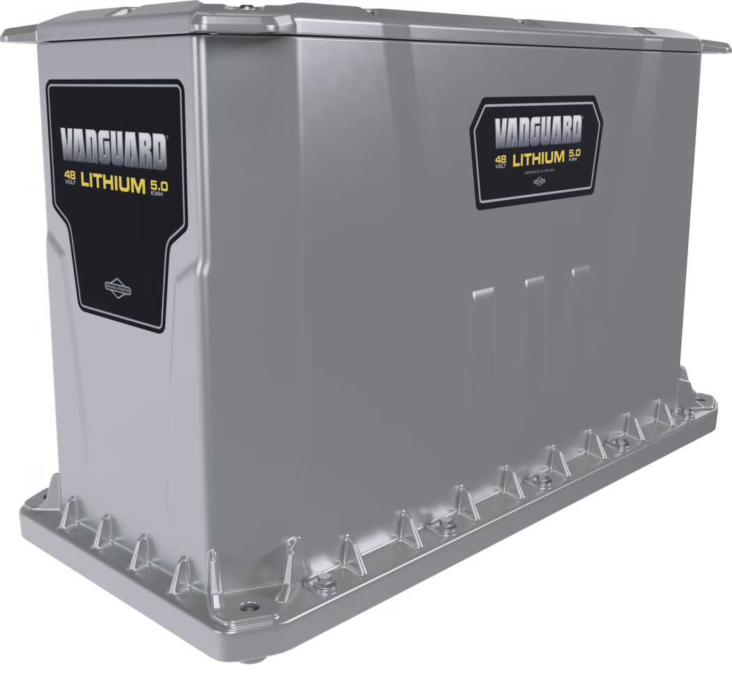 WOLFF_Dummy_172588_Battery Li-Io 5kW-100Ah Independence_2025-08 A modern, rectangular lithium battery with a sleek silver casing. It features clear branding labeled 'Vanguard' along with specifications indicating a voltage of 48 volts and a capacity of 5.0 kWh. The battery has a robust and durable design, suitable for various applications, likely related to renewable energy or electric vehicles. The packaging is designed for optimal heat dissipation and safety, with a strong base that includes several mounting points.